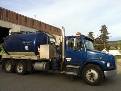 D&L vacuum truck outside the shop