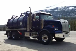 D&L vacuum truck with mountains behind