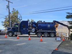 D&L hydrovac truck working safely under power lines