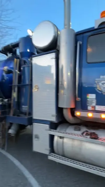 D&L vacuum truck at a car wash for pit and separator cleaning