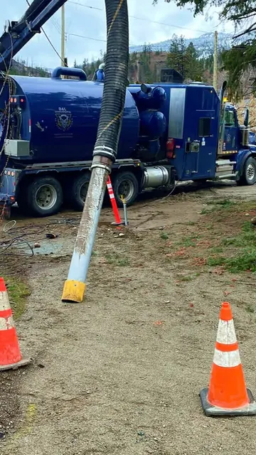 D&L hydrovac truck with its boom down at an excavation