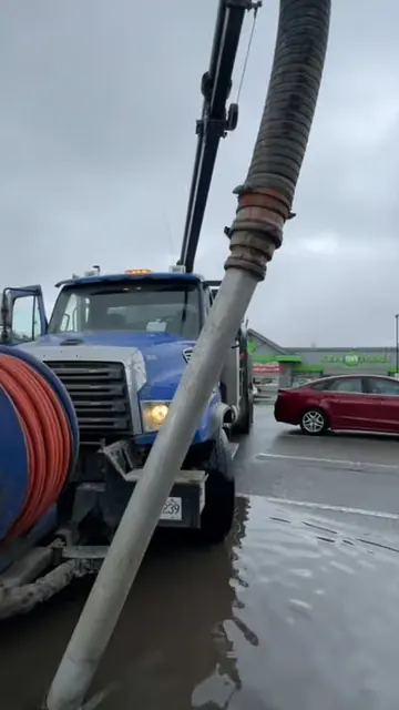 D&L vacuum truck clearing flood water from a Kelowna street